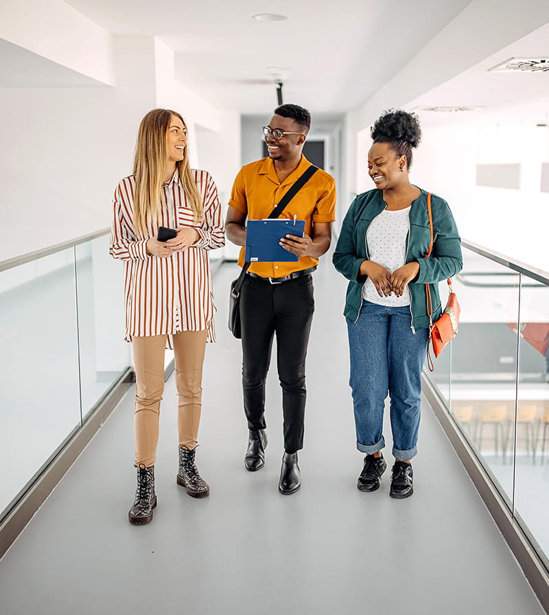 Group of interns walking down a hallway