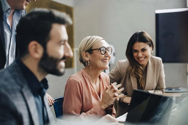 Group of employees presenting an idea at a meeting